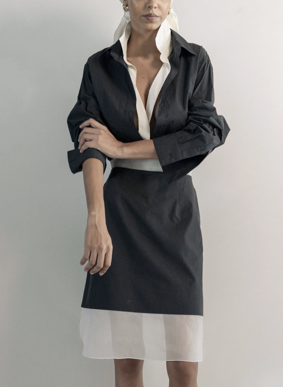 model wearing Voranida shirt and skirt