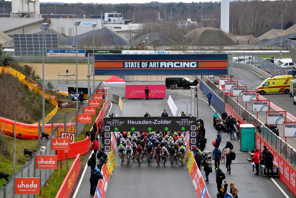 ZOLDER BELGIUM DECEMBER 26 Start Mathieu Van Der Poel of The Netherlands and Team AlpecinFenix Eli Iserbyt of Belgium and Team Pauwels Sauzen Bingoal Wout Van Aert of Belgium and Team Jumbo Visma Peloton Zolder Circuit Public Landscape during the 16th HeusdenZolder World Cup 2020 Men Elite CX SPHeusdenZolder SuperprestigeCX Cyclocross on December 26 2020 in Zolder Belgium Photo by Luc ClaessenGetty Images