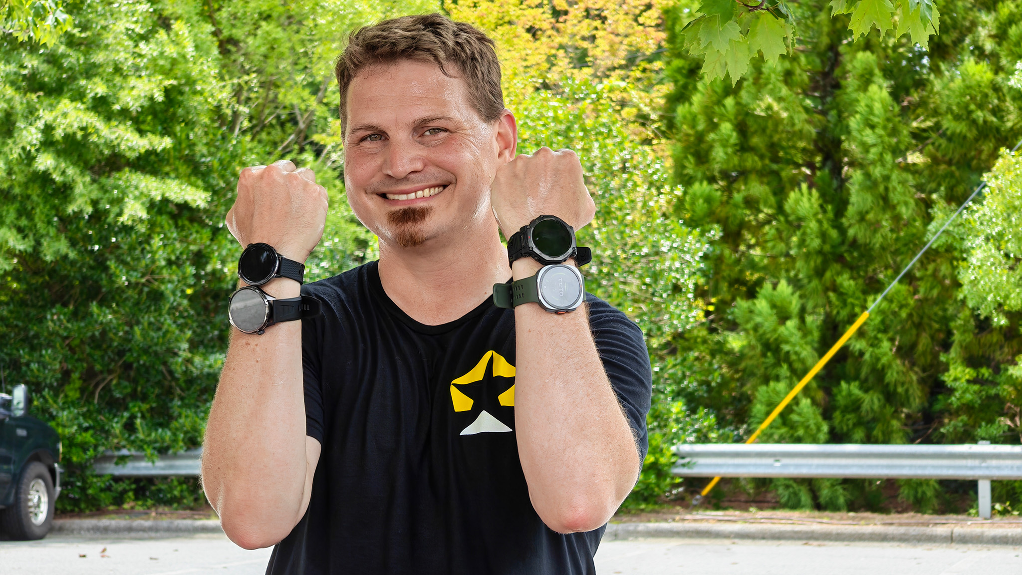 Wearing a Samsung Galaxy Watch Ultra 2, Amazfit T-Rex 3 Pro, OnePlus Watch 3 43mm, and Honor Watch 6 during a run