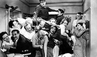 A Night At The Opera The Marx Brothers packed in a state room full of people