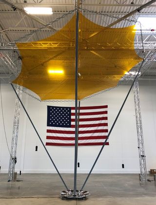 The antenna for the R3D2 spacecraft during deployment tests on the ground.