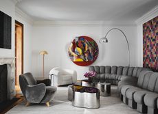 modern grey living room decorated using the principles of rhythm in interior design