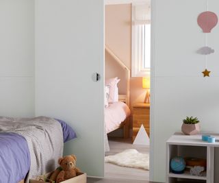 white dividing doors in shared bedroom