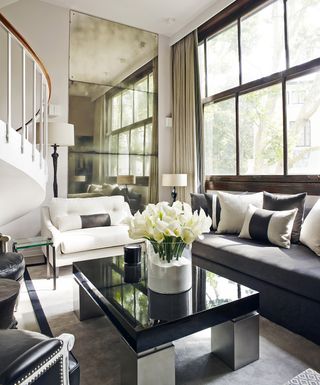 Kelly Hoppen's living room with white calla lillies on the coffee table