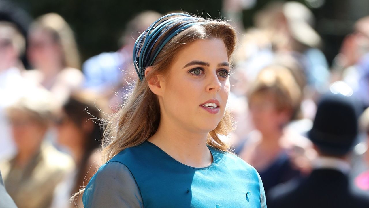 Princess Beatrice arrives at St George&#039;s Chapel at Windsor Castle before the wedding of Prince Harry to Meghan Markle on May 19, 2018 in Windsor, England