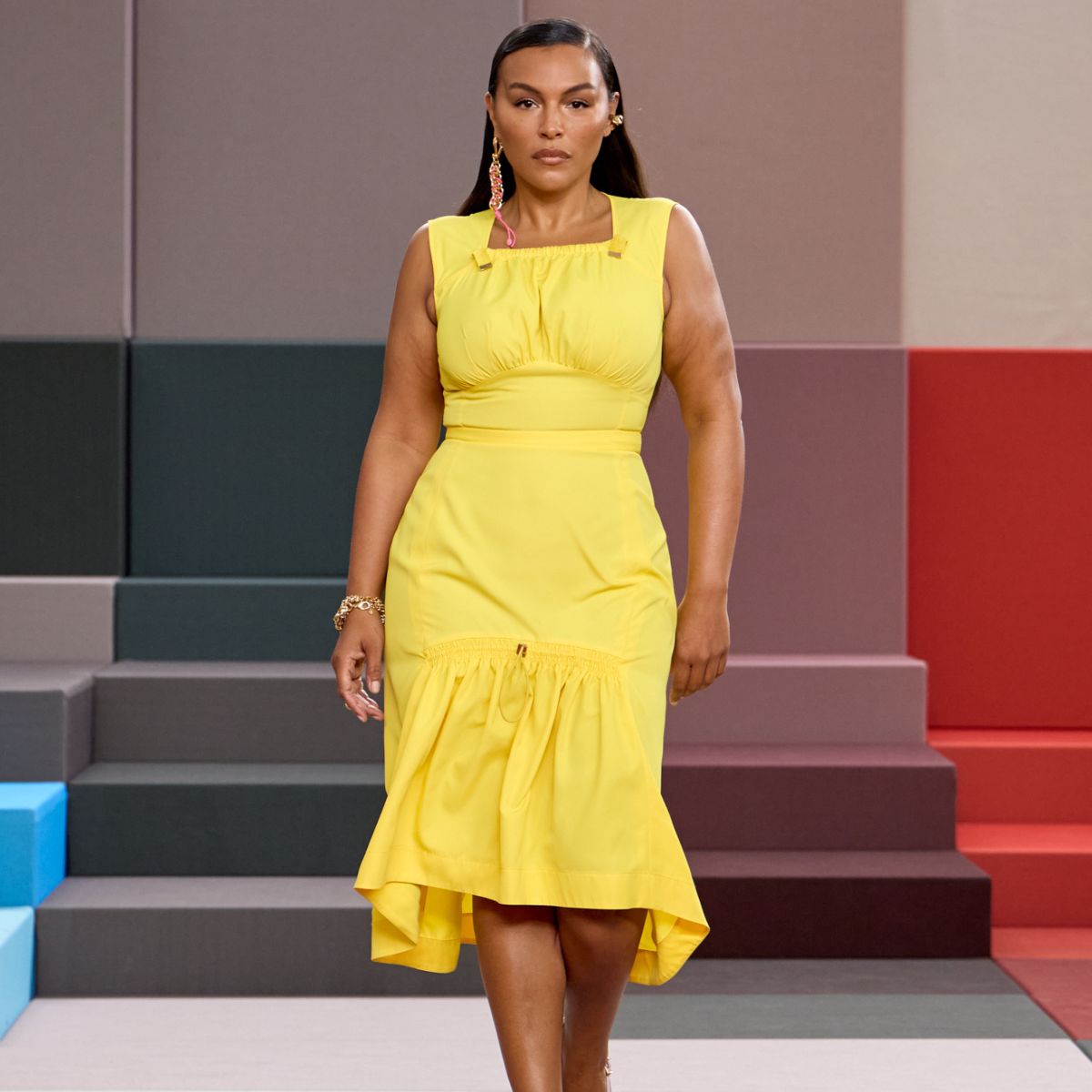 paloma elsesser wears a yellow dress for the fendi ss26 show at milan fashion week