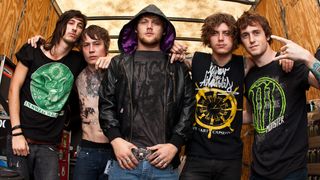 Worsnop, centre, with Asking Alexandria in 2011