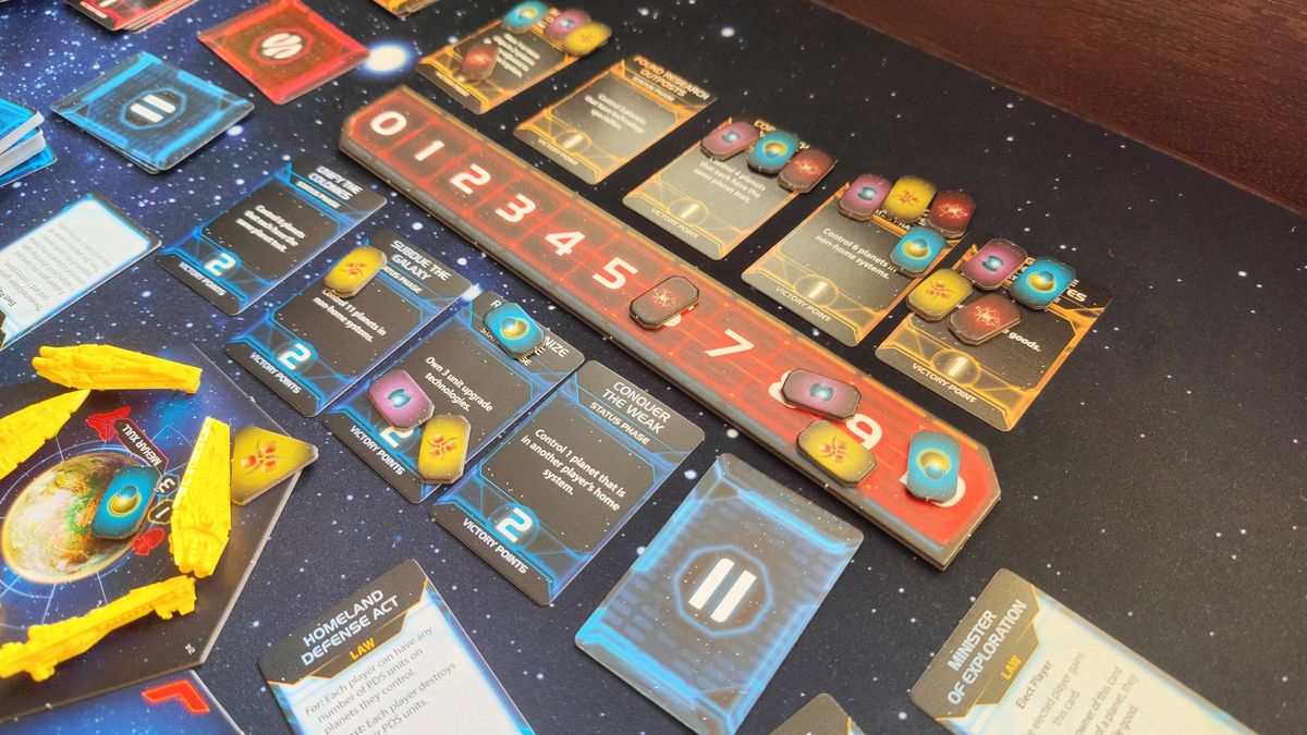 Twilight Imperium cards and tokens, as seen laid out on a table