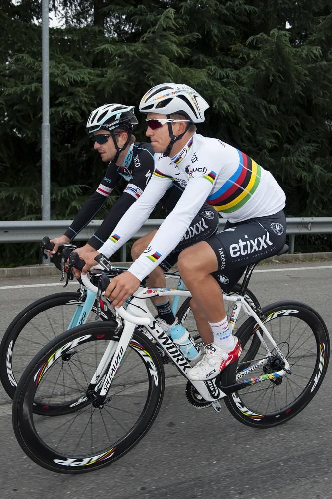 Michal Kwiatkowski rides along with fellow Pole Michal Golas