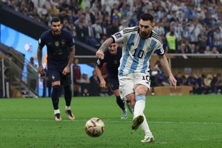 Lionel Messi of Argentina scores the opening goal from the penalty spot during the FIFA World Cup Qatar 2022 Final match between Argentina and France 