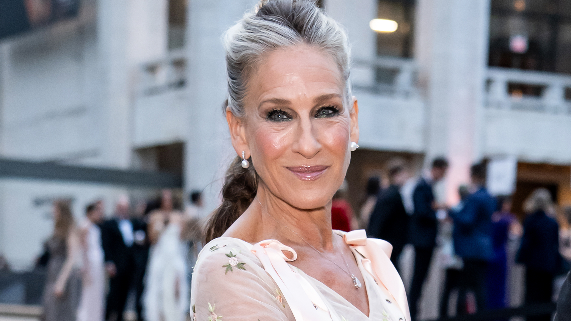 Sarah Jessica Parker walks the red carpet at the NYC Ballet Fall Fashion Gala in a sheer Simone Rocha dress