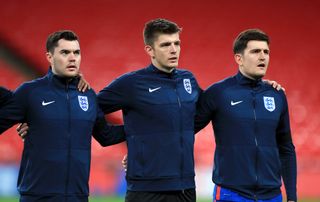 England players Michael Keane, Nick Pope and Harry Maguire