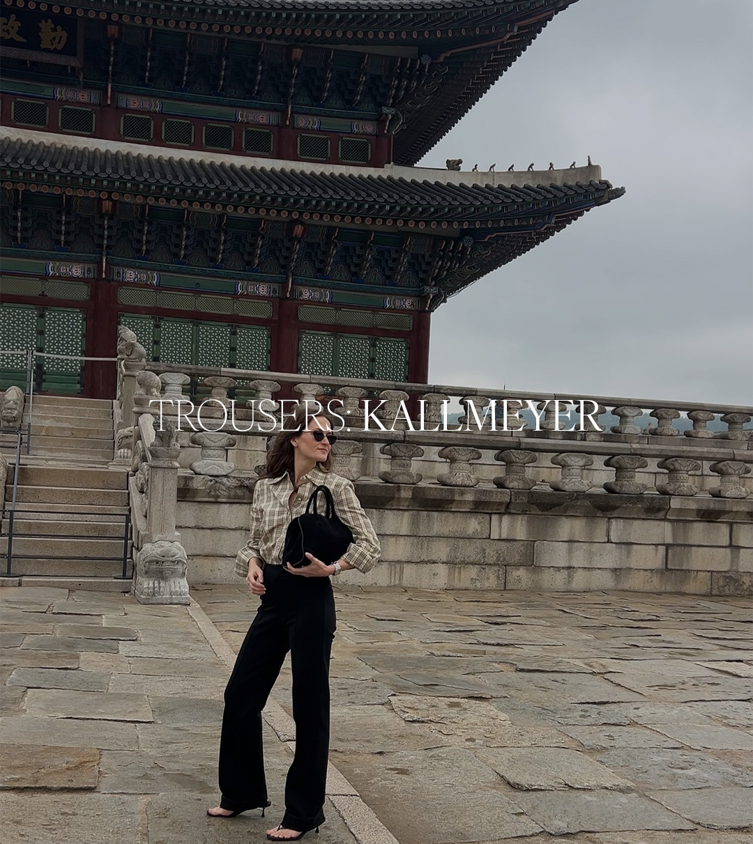 Eliza Huber wearing Kallmeyer trousers with a plaid shirt and black bag. Text reads: "Trousers: Kallmeyer."