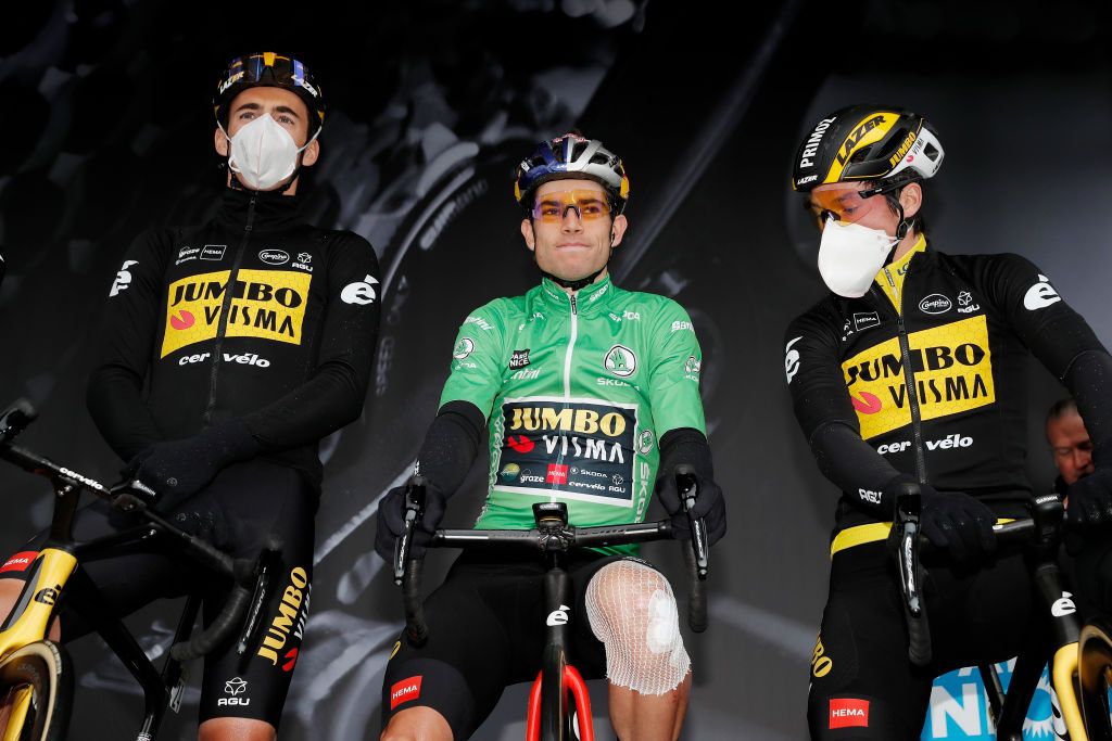 NICE FRANCE MARCH 13 LR Christophe Laporte of France and Team Jumbo Visma Wout Van Aert of Belgium and Team Jumbo Visma green points jersey and Primoz Roglic of Slovenia and Team Jumbo Visma yellow leader jersey during the team presentation prior to the 80th Paris Nice 2022 Stage 8 a 1156km stage from Nice to Nice ParisNice WorldTour on March 13 2022 in Nice France Photo by Bas CzerwinskiGetty Images