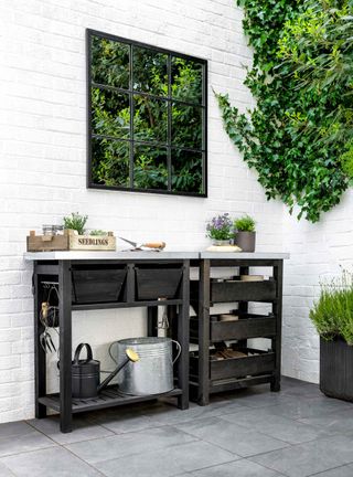 garden trading potting bench with living wall and mirror