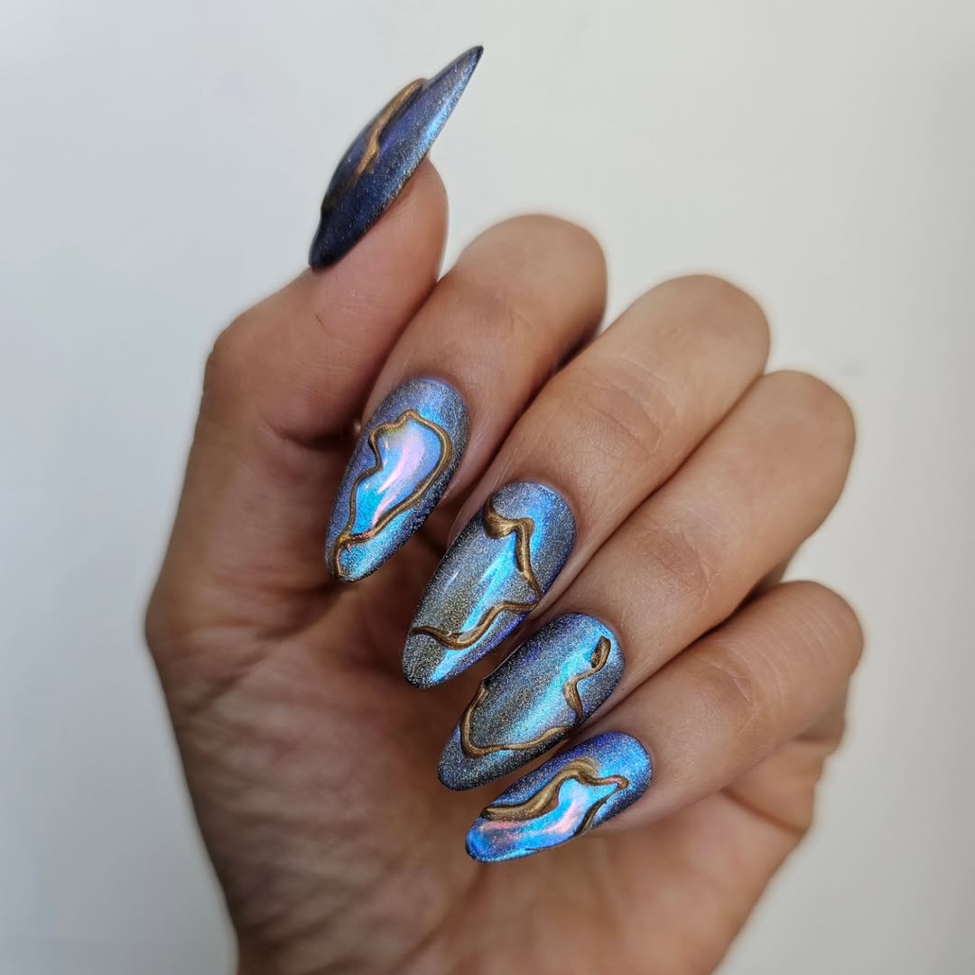 blue and gold cat eye nails