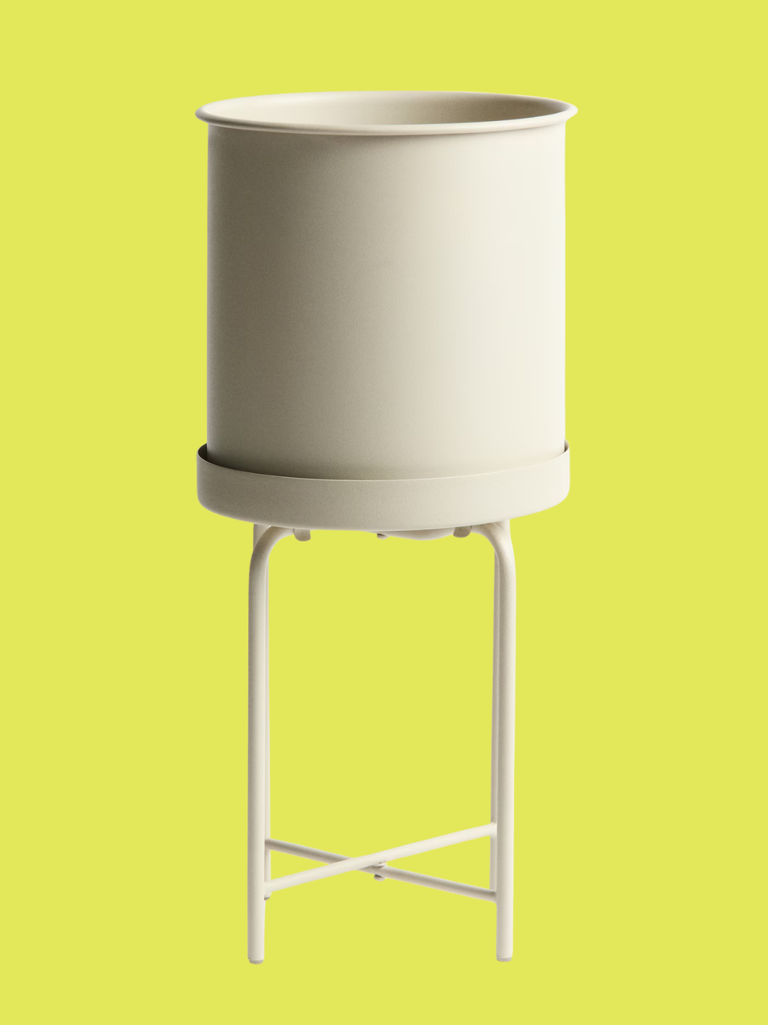 A white metal plant pot on a stand from H&amp;amp;m