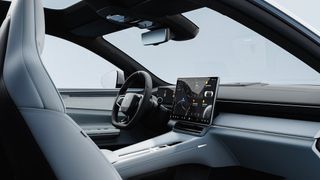 The Polestar 4 interior including wheel (right-hand drive version) and rear-view mirror-like display