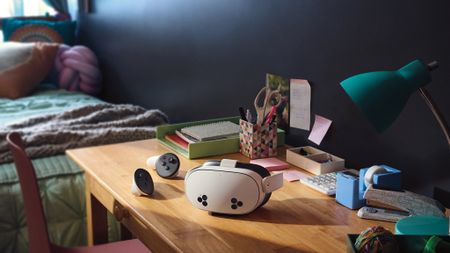 The Meta Quest 3S sitting on a desk.