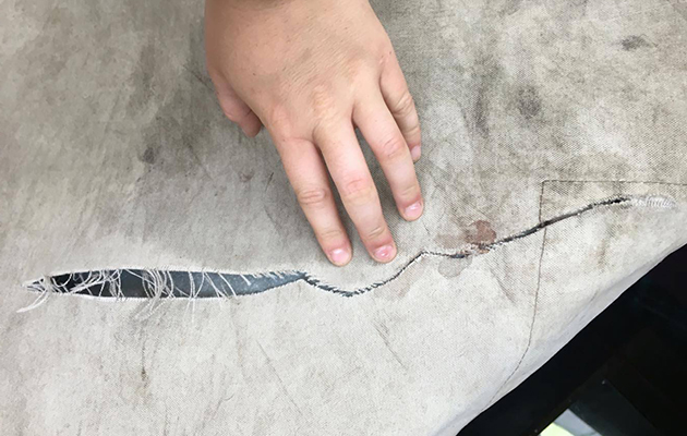ripped-rug