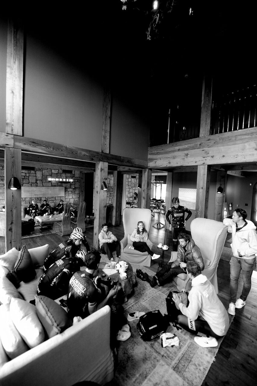 The team gathers in the Swamp Rabbit Lodge for a meeting.
