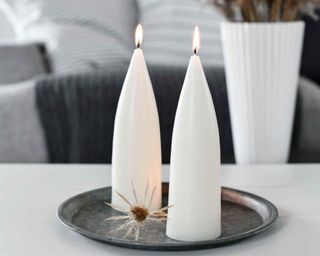 Two Danish Cone Candles in white on tray