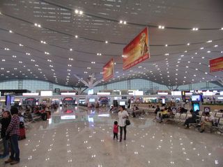 The vast interior of Shenzhen North may be a contemporary architectural touchstone in the making: part airport, stadium, shopping centre and train station.