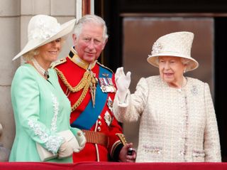 Camilla, Duchess of Cornwall, Prince Charles, Prince of Wales and Queen Elizabeth II watch a flypast from the balcony of Buckingham Palace