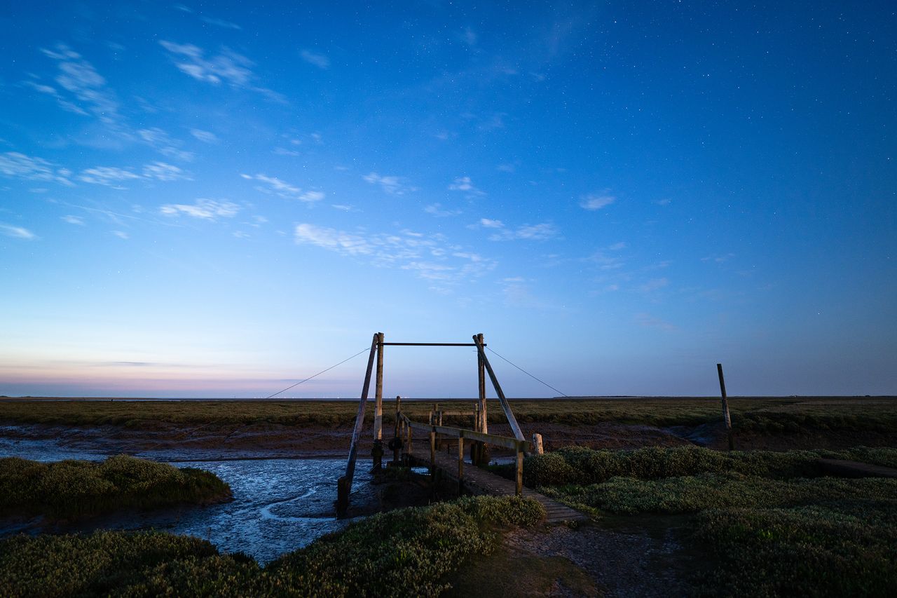 Photo of a harbour at night with stars in the sky taken with the Viltrox AF 16mm f/1.8 FE lens
