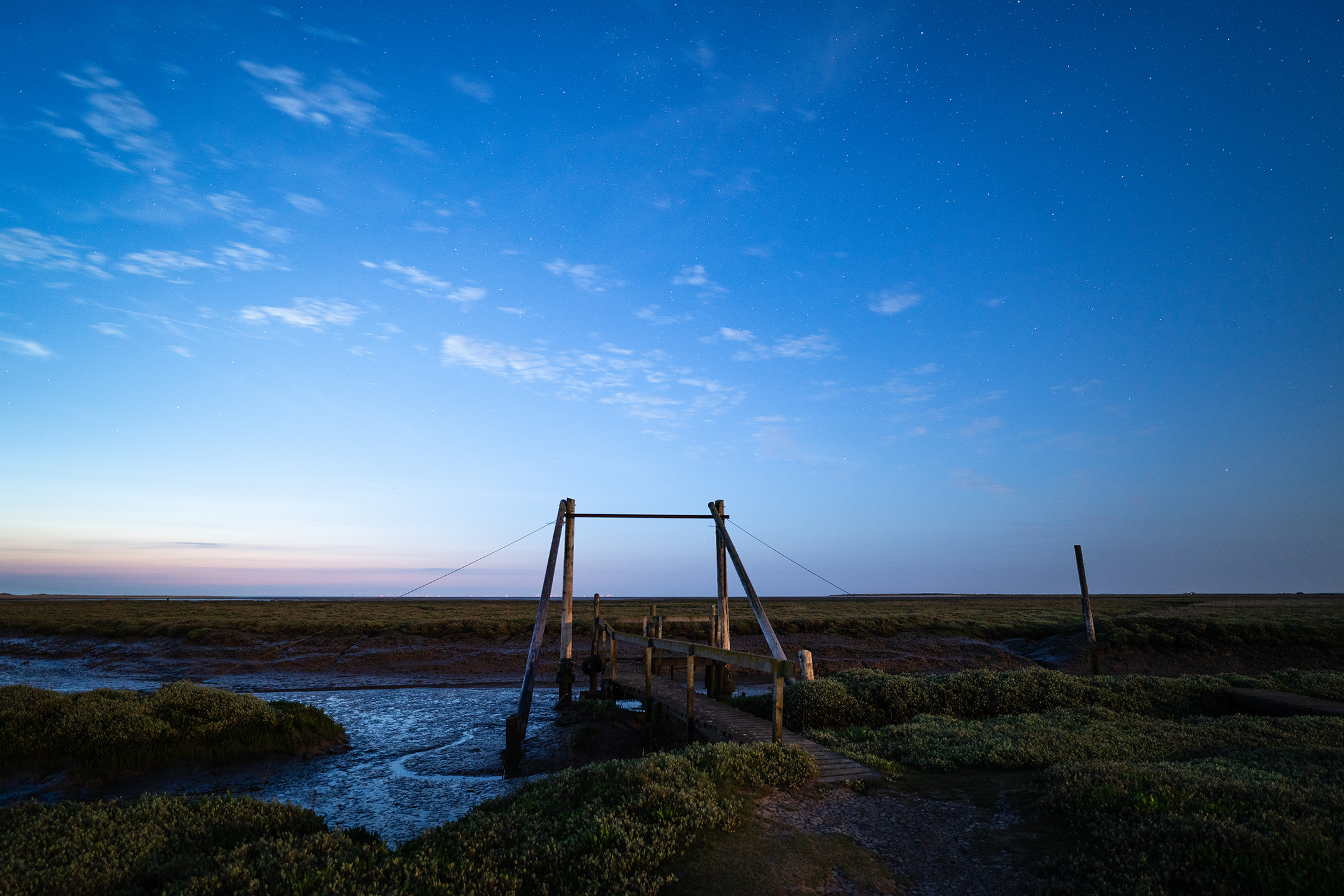 Photo of a harbour at night with stars in the sky taken with the Viltrox AF 16mm f/1.8 FE lens