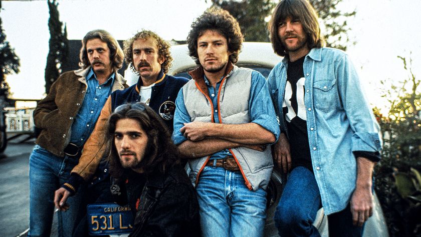 The Eagles are, standing left to right, Don Felder, Bernie Leadon, Don Henley, and Randy Meisner, with guitarist Glenn Frey kneeling. 