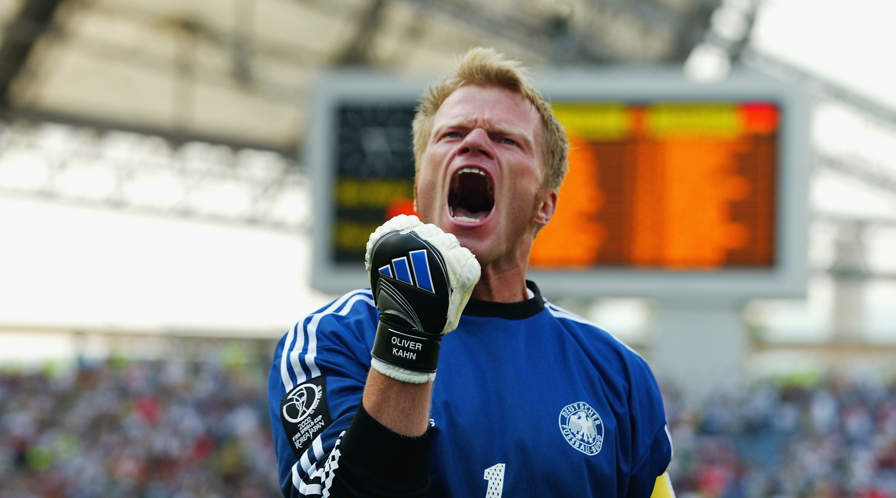 SEOGWIPO - JUNE 15: Goalkeeper Oliver Kahn of Germany celebrates Oliver Neuville's winning goal during the Germany v Paraguay, World Cup Second Round match played at the Seogwipo-Jeju World Cup Stadium in Seogwipo, South Korea on June 15, 2002. Germany won 1-0. (Photo by Ben Radford/Getty Images)