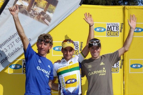 The men's podium: Mannie Heymans (3rd), Kevin Evans (1st), Marc Bassingthwaighte (2nd).