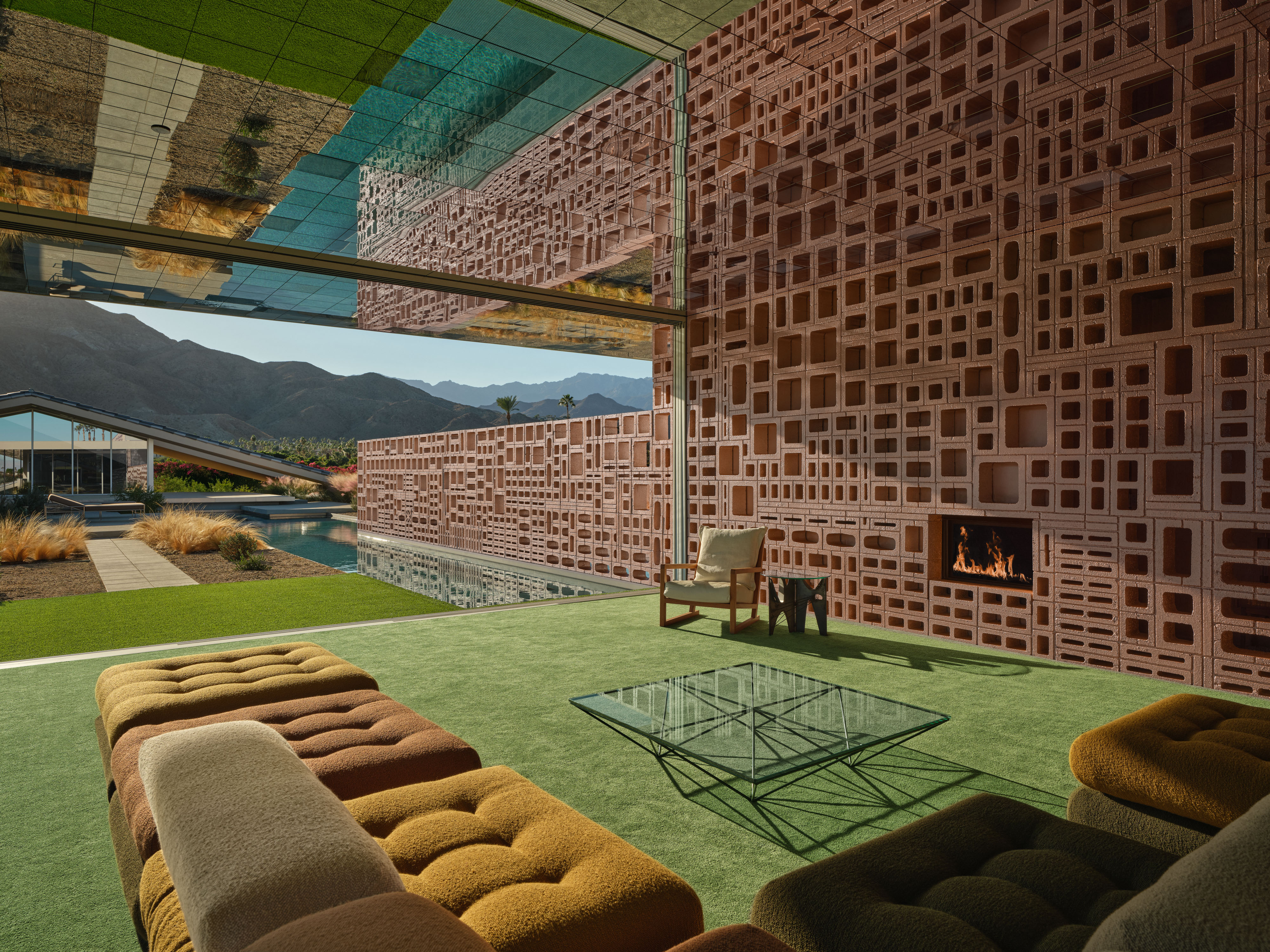 Desert house by Robert Stone, a home made with perforated partitions and an intense pitched low roof