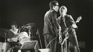 Elvis Costello, Bruce Thomas, Pete Thomas, Elvis Costello and the Attractions, Jazz Bilzen Festival, Bilzen, Belgium, 11/08/1977.