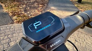 Segway Kickscooter ZT3 Pro parked on sidewalk