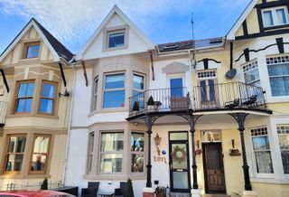 The six-bedroom property is located a short walk of Porthcawl seafront 