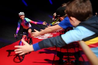 Kasia Niewiadoma greets fans in t 'Kuipke velodrome at the team presentation of the 2024 Omloop Het Nieuwsblad