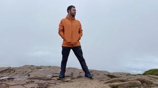 inov-8 VentureLite Jacket: hiking on a summit