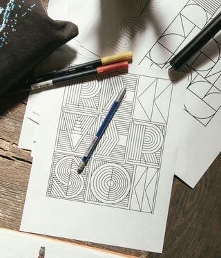 Graphic alphabet designs on paper