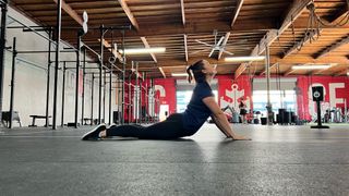 Physical therapist Kait Ireland demonstrates a cobra pose