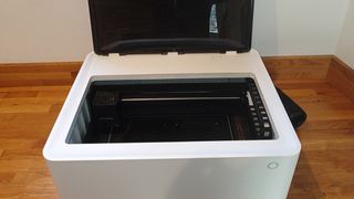 xTool M1 review; the lid of a laser cutter is open