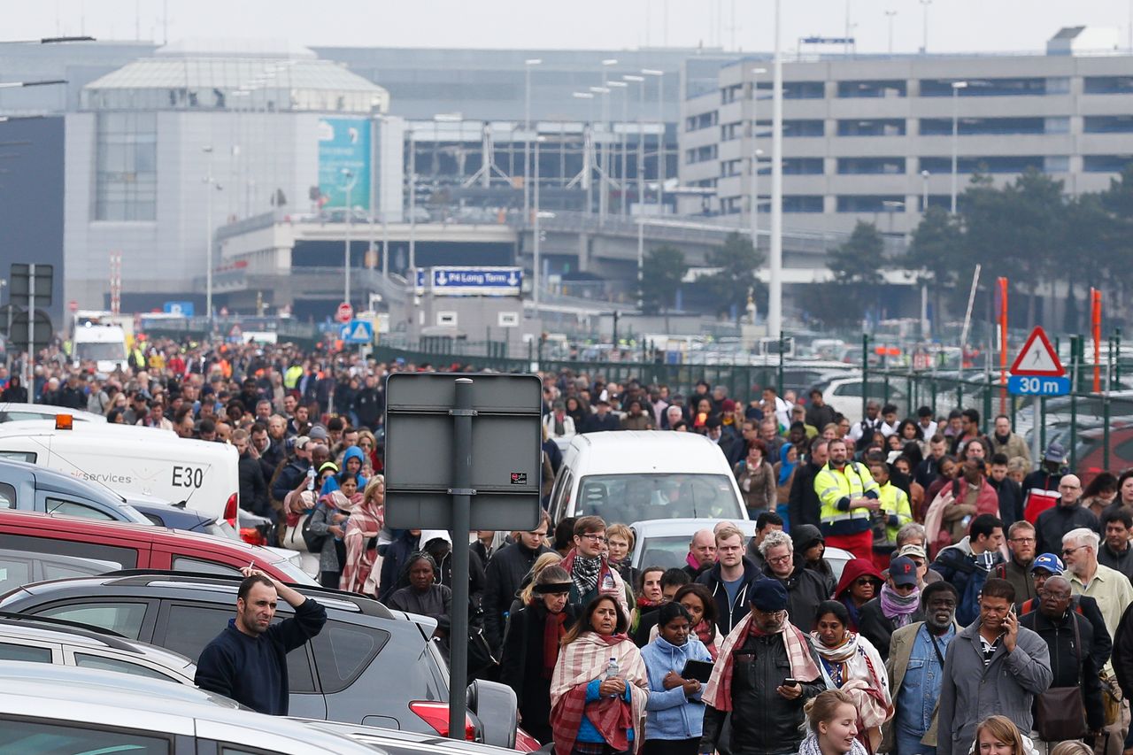 Passengers and airport staff are evacuated from the terminal building after explosions at Brussels Airport in Zaventem near Brussels, Belgium.