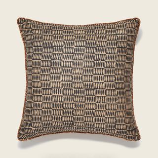 A brown leaf pattern cushion