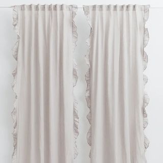 Linen blend drapes in soft beige, with ruffled edges