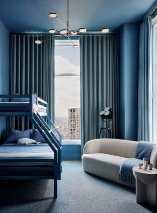 A bedroom drenched in all blue