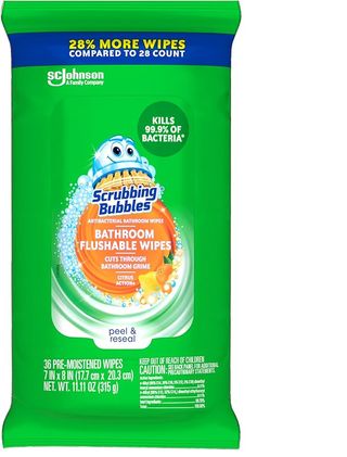 A green container of Scrubbing Bubbles antibacterial bathroom wipes