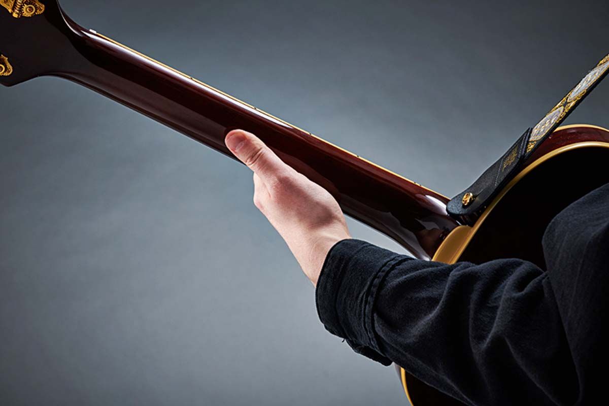 Wide stretches on bass strings are impossible with a thumb-over grip, so Joe uses this more classical position on his funkiest riffs round the bottom end.