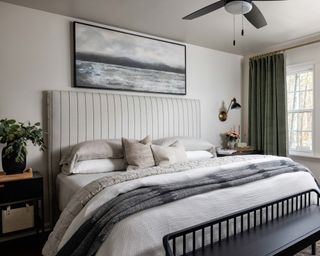 neutral bedroom with white walls, gray cozy decor