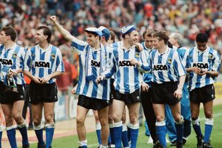 Sheffield Wednesday players do a lap of honour after winning the 1991 League Cup final against Manchester United